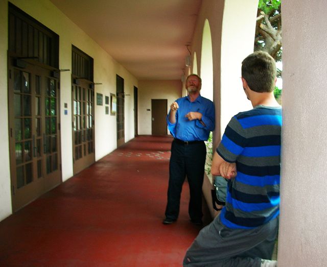 Joe Halcott chats with Adam Frost in the hallway of the La Jolla Recreation Center.